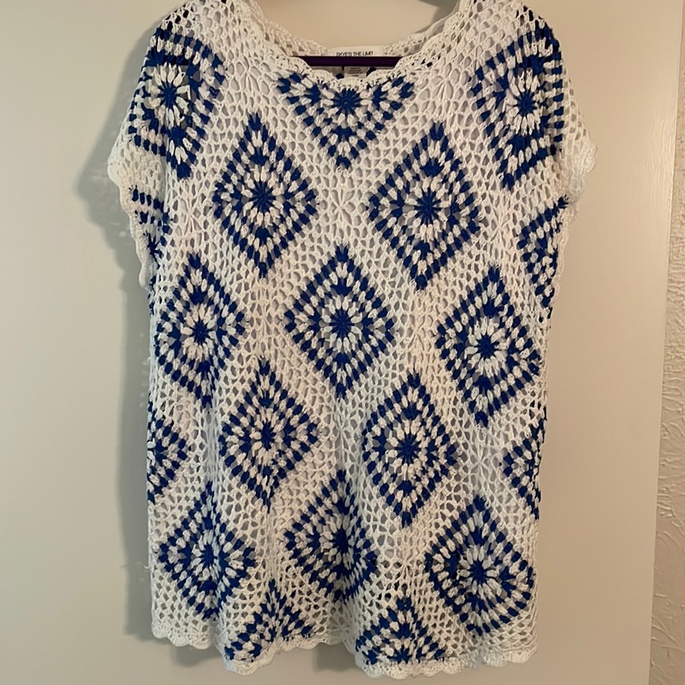 New, never worn white and blue shirt sleeve crochet blouse.